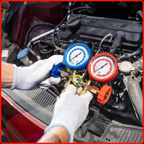 Mechanic checking engine and electrical systems in a car at Shift Masters Transmissions Phoenix AZ