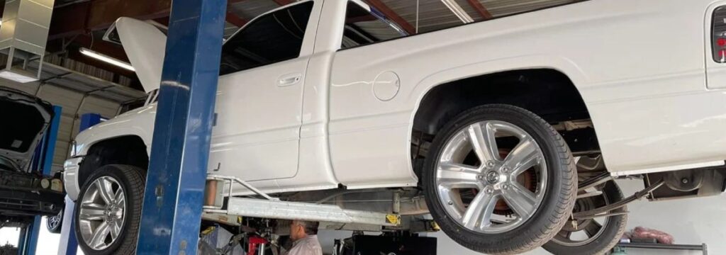 Truck lifted for inspection and maintenance at Shift Masters Transmissions in Phoenix AZ