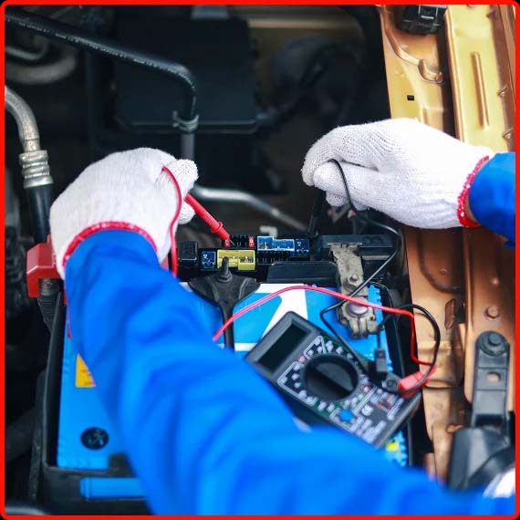 Technician testing a vehicle’s system diagnostics at Shift Masters Transmissions in Phoenix AZ