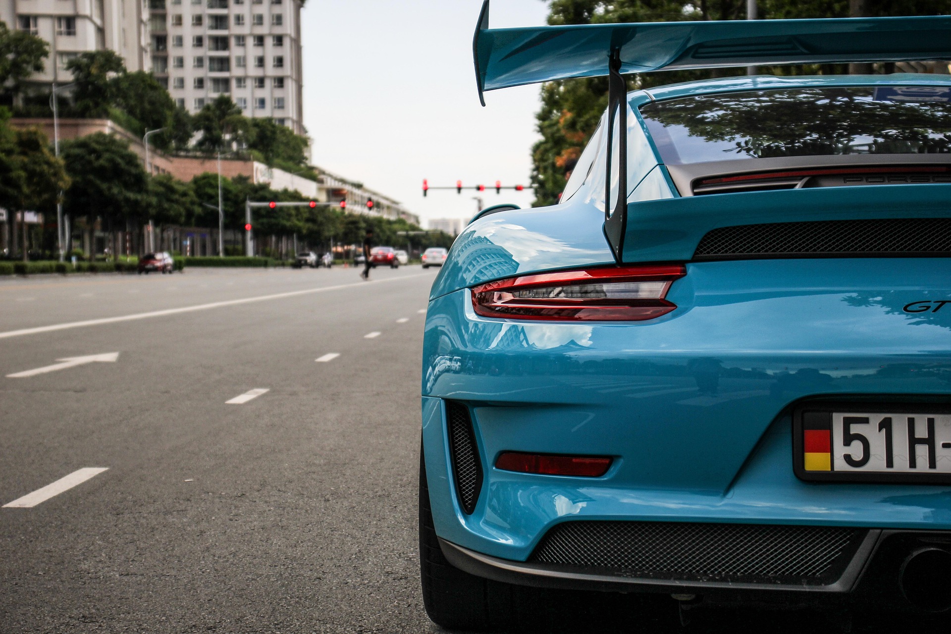 Blue Porsche rear end with performance wing representing transmission repair services at Shift Masters Transmissions Phoenix Arizona