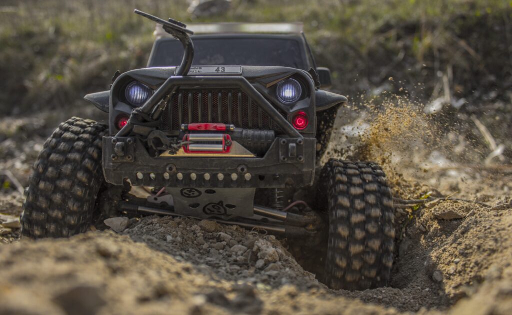 Jeep Wrangler with oversized tires and snorkel off-roading after transmission service at Shift Masters Transmissions Phoenix Arizona