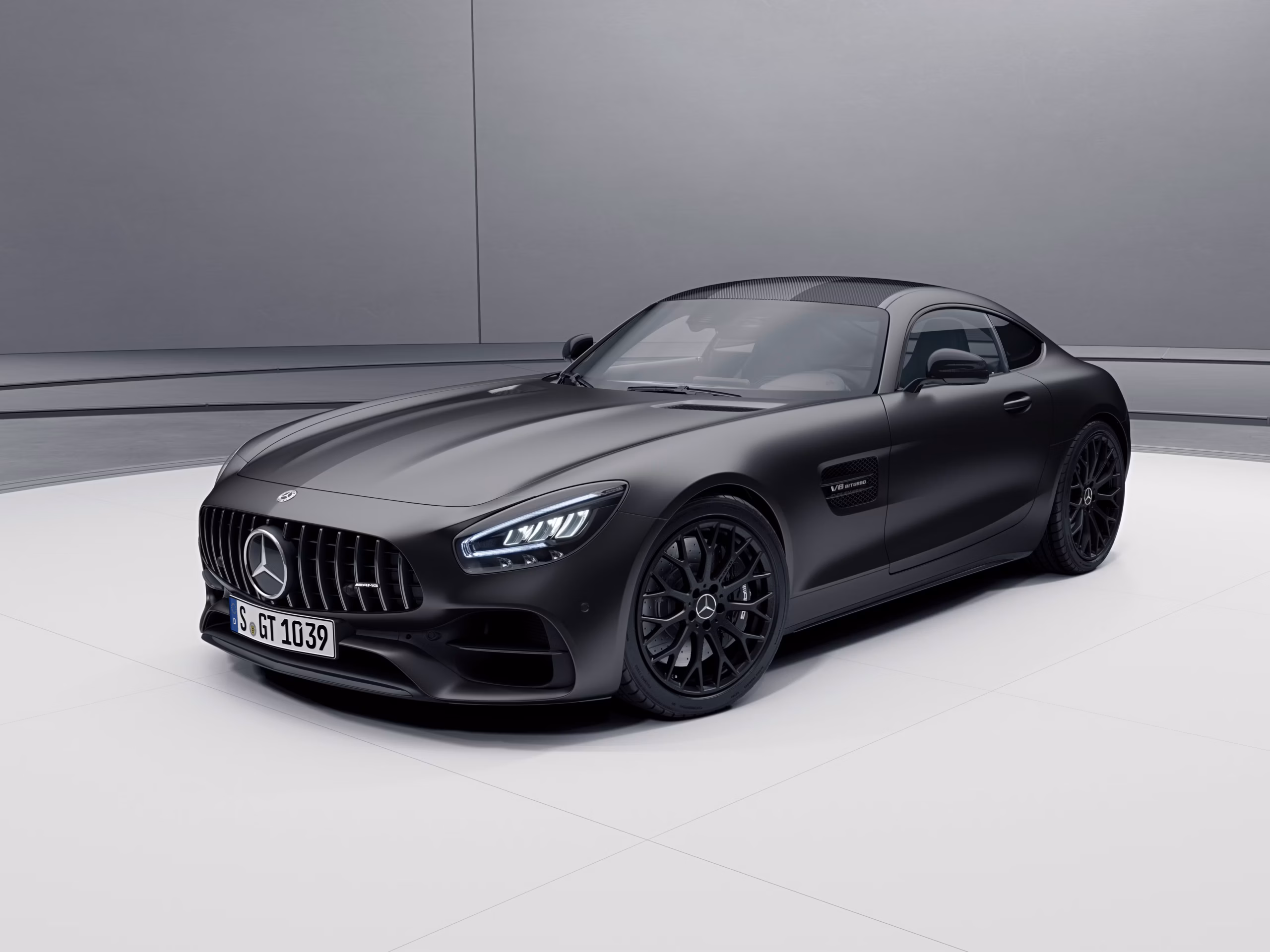 Professional automotive technician performing vehicle inspection and transmission service in Phoenix Arizona