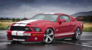 Red Ford Mustang GT500 leaving Shift Masters Transmissions after professional transmission repair and diagnostics in Phoenix, Arizona.