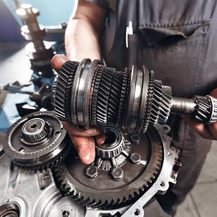 Experienced transmission repair technicians servicing vehicles at a Phoenix Arizona transmission shop